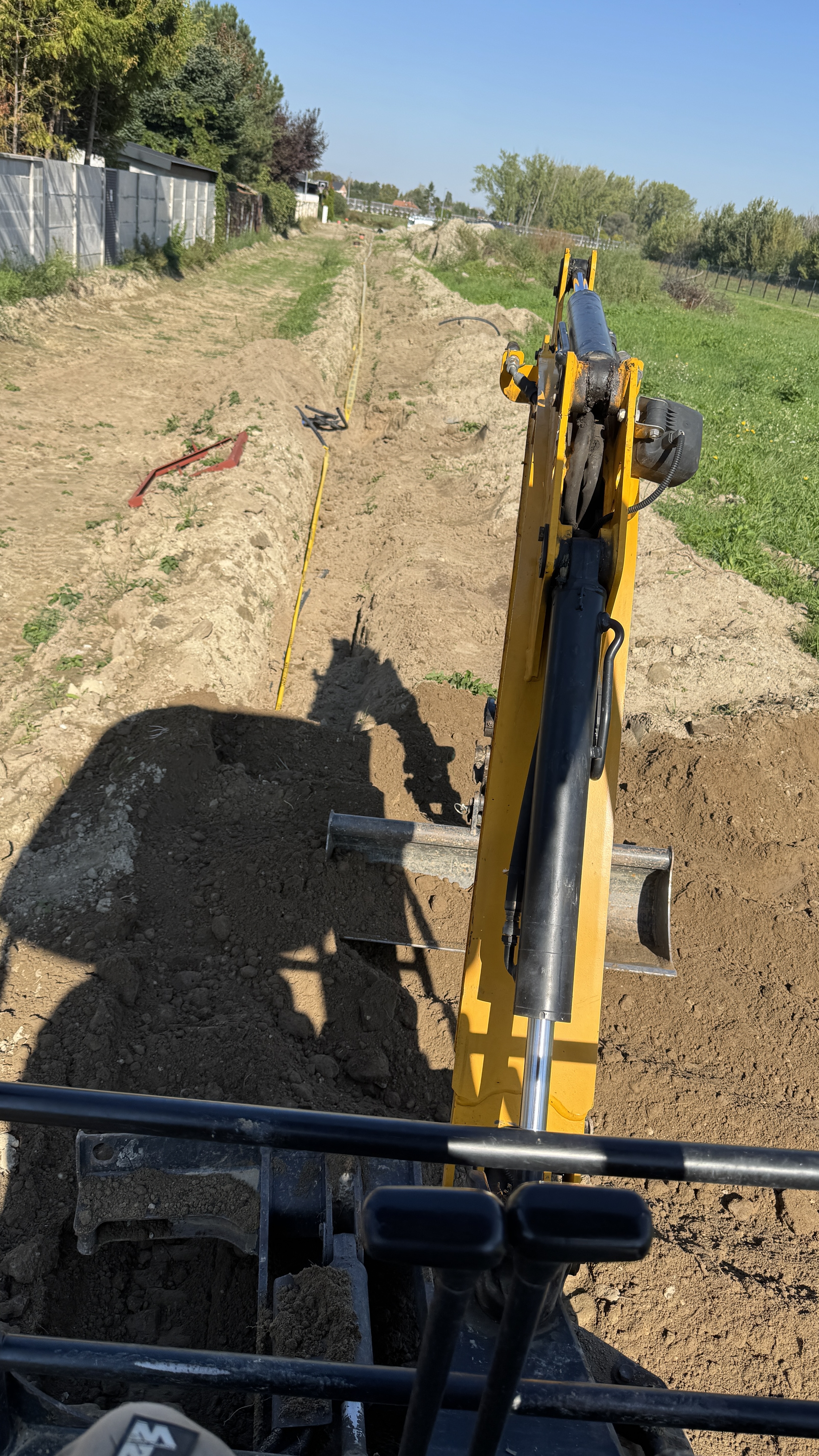 JCB kotró munka közben